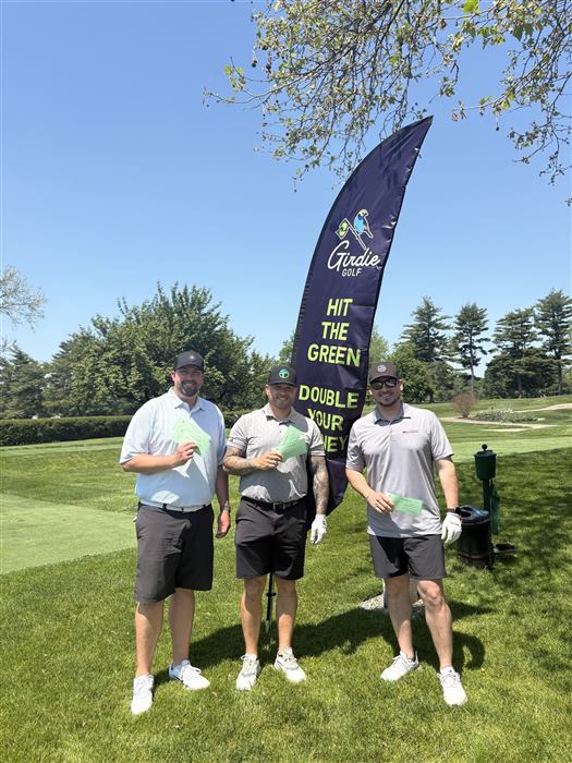 Three golfers holding their Girdie Golf gift cards